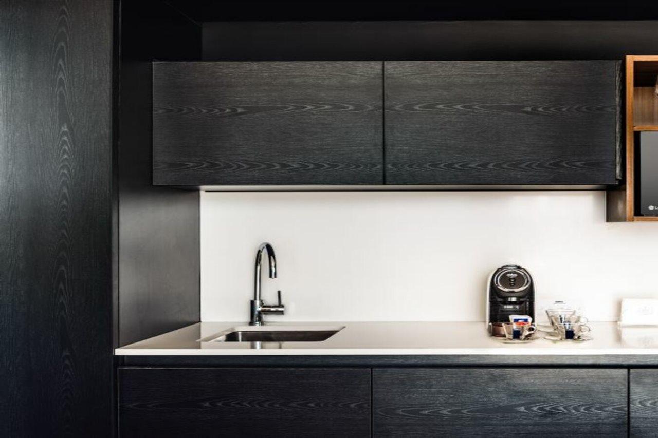 Sls Buenos Aires Puerto Madero Ξενοδοχείο Εξωτερικό φωτογραφία A kitchen in a serviced apartment