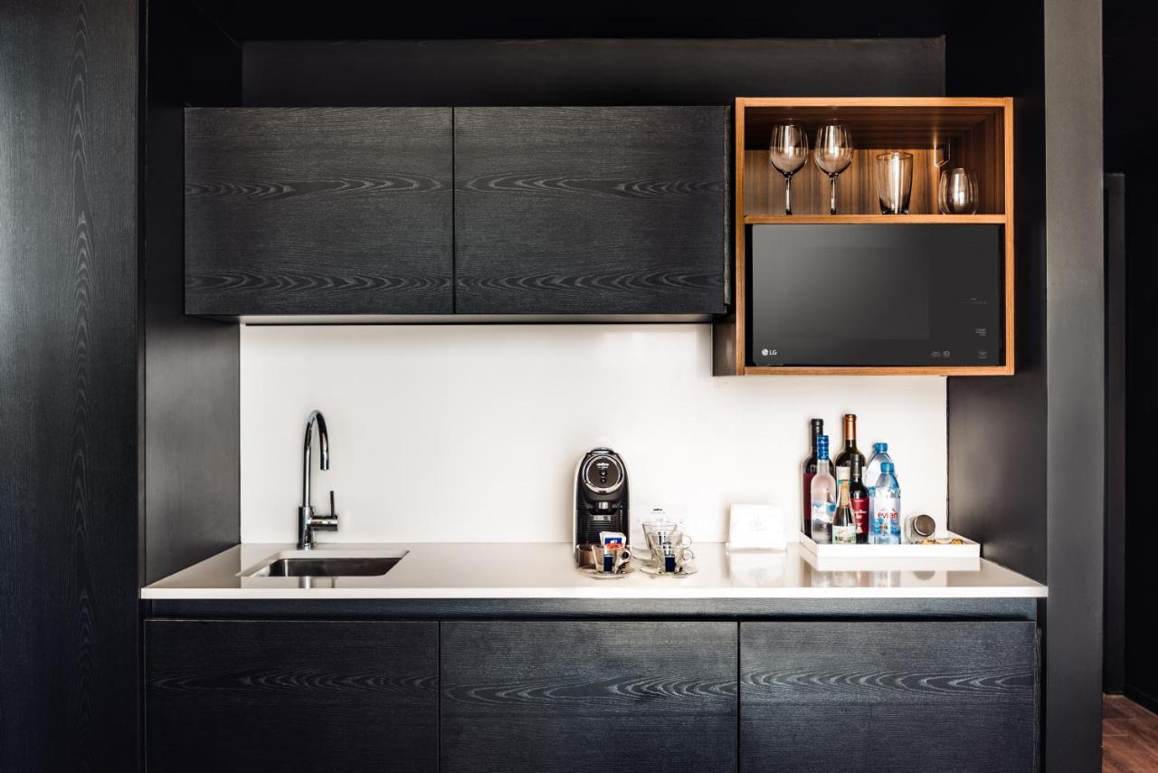 Sls Buenos Aires Puerto Madero Ξενοδοχείο Εξωτερικό φωτογραφία A wet bar in a hotel room