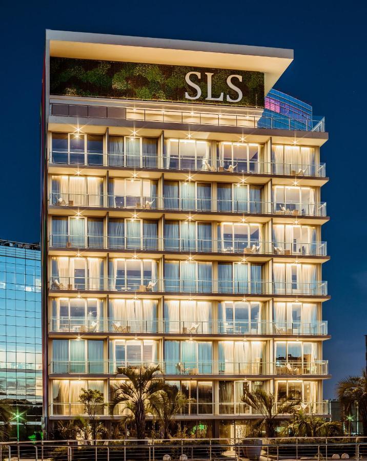 Sls Buenos Aires Puerto Madero Ξενοδοχείο Εξωτερικό φωτογραφία The hotel at night